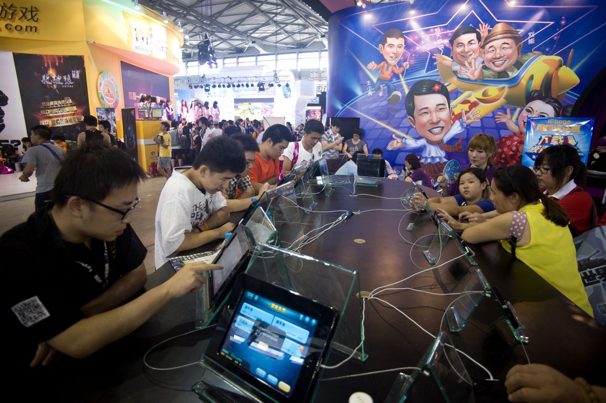 Mandatory Credit: Photo by Wu Hong/EPA/REX/Shutterstock (7667343d) Chinese Game Enthusiasts Try out the Latest Computer Games at the China Digital Entertainment Expo in Shanghai City China 26 July 2012 the Four-day Expo Also Known As China Joy Presents Many New Onling Game Products by 349 Companies From More Than 30 Countries the Sales Income of the Chinese Gaming Industry Reached 44 6 Billion Yuan (euro 5 75 Billion) in 2011 Which is a Growth of 34 Per Cent Compared to 2010 Reports State China Shanghai China Digital Entertainment Expo - Jul 2012 